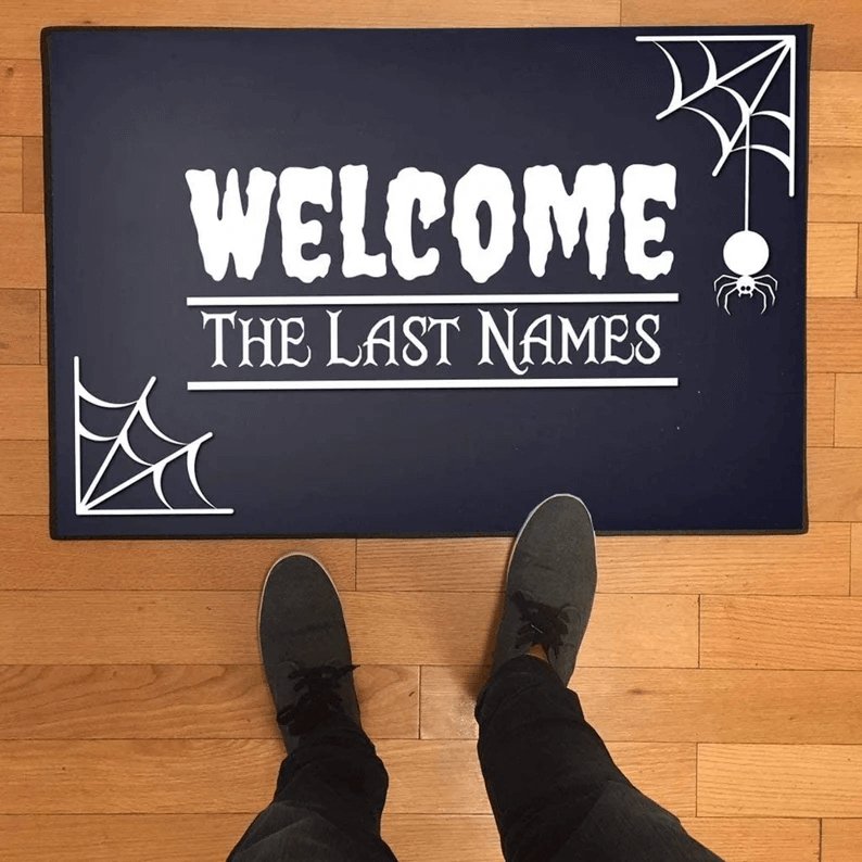 http://www.victorystore.com/cdn/shop/products/welcome-with-spider-webs-custom-last-name-halloween-doormat-24-x36-480662.jpg?v=1693517302